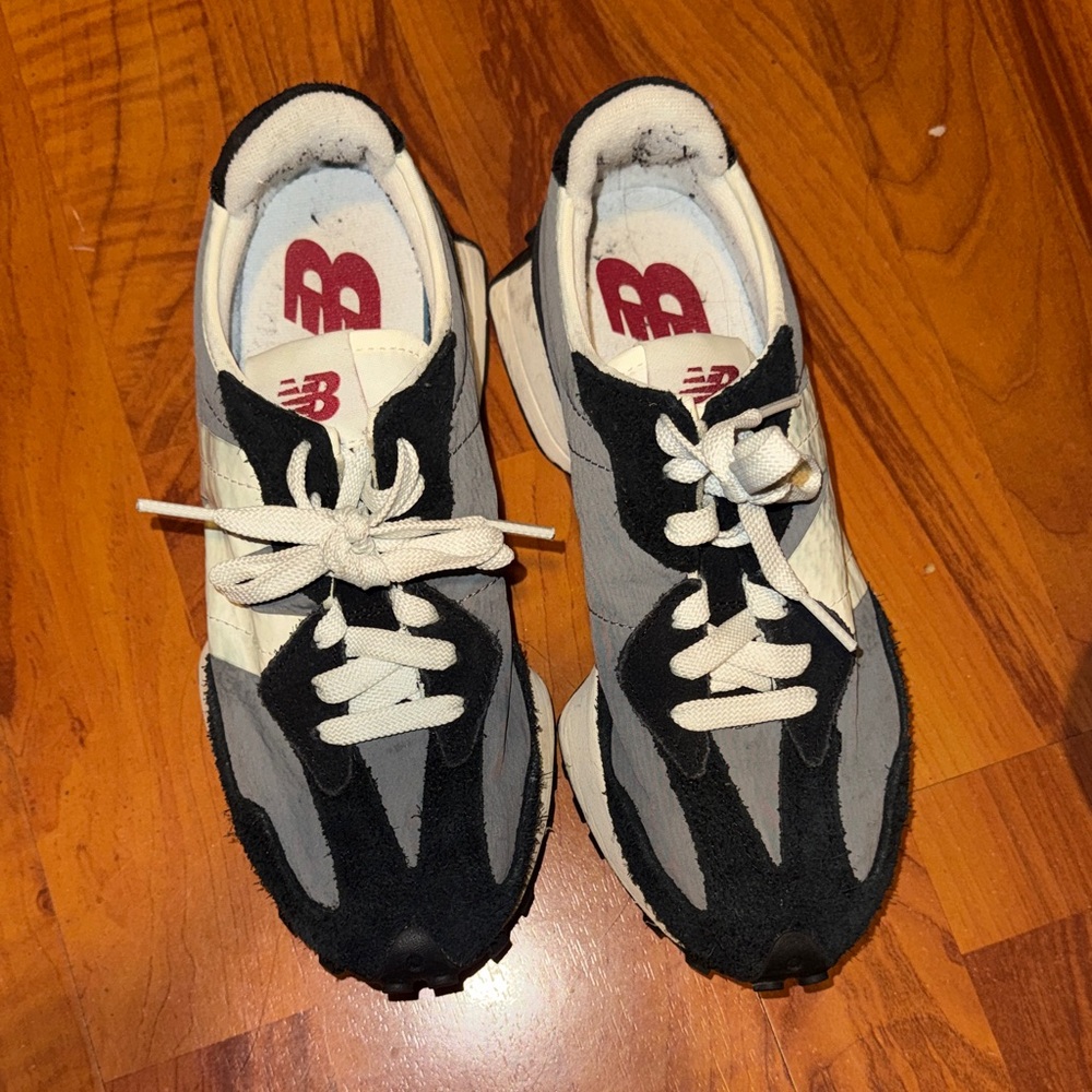 New Balance women’s Black and White Sneakers